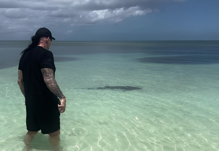 wwe the Undertaker wife - The Undertaker scared off a curious shark while on holiday